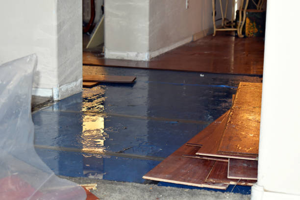 Professional Flood Damage Restoration technician working in Nottingham, NH